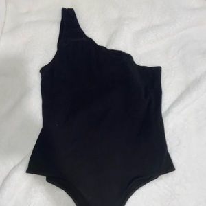 Black one shoulder body suit